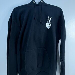 Black Men's Pullover Hoodie with White Skeleton Peace Hand Graphic